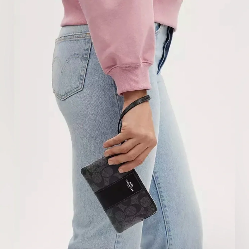 Coach Corner‎ Zip Wristlet In Signature Canvas in SV/Graphite/Black